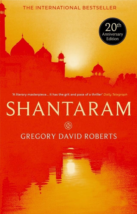 Book cover of 'Shantaram' with a silhouette of a building and sunset, featuring Gregory David Roberts' name.