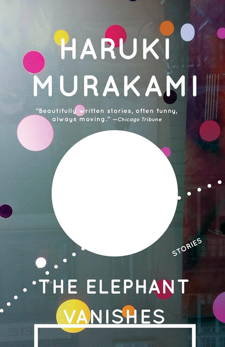 This image features the cover of "The Elephant Vanishes: Stories" by Haruki Murakami. The cover design is minimalist with a background of soft blue and purple hues, adorned with an array of abstract, out-of-focus lights creating a dreamlike atmosphere.